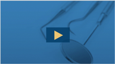 3 dental hygenists tools on a dark blue background